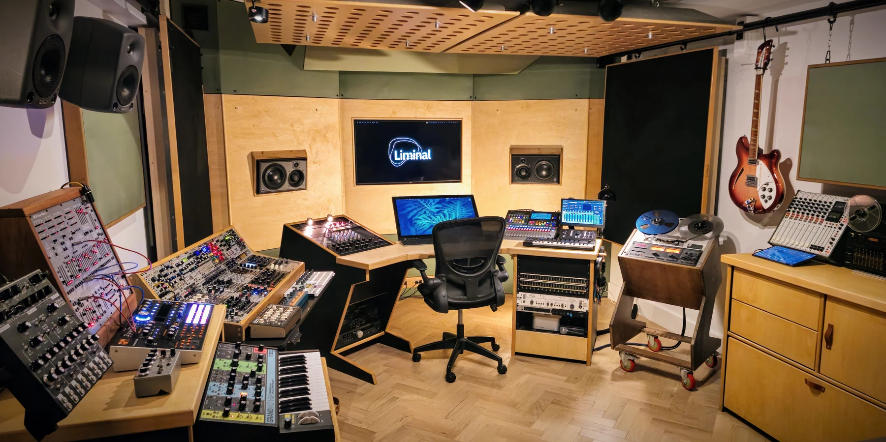 Liminal Audio mastering room with monitoring, acoustic treatment and studio equipment